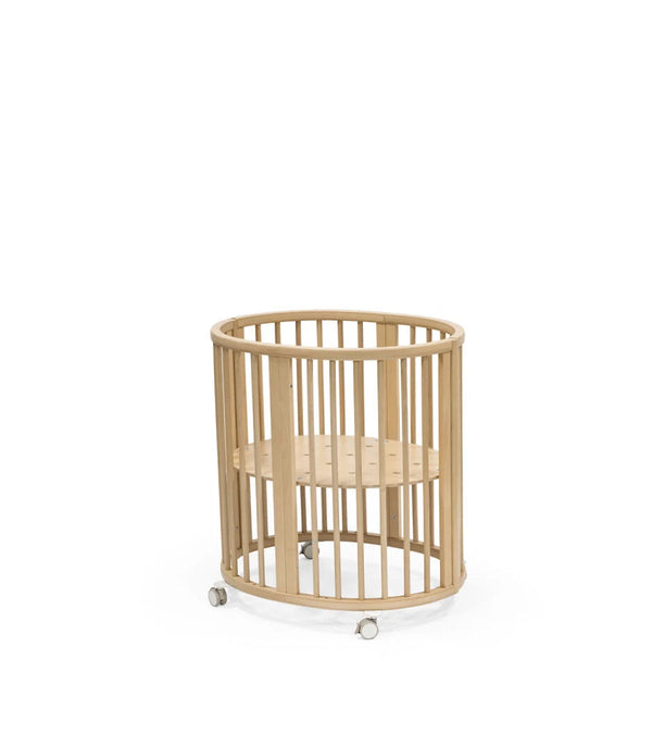 Stokke Sleepi Mini Bed V3 Compact Oval Crib with Lockable Wheels for Newborns 0-6 Months